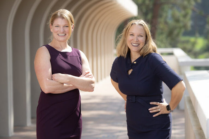 Candice Odgers (left), UCI professor of psychological science, and Gillian Hayes, UCI vice provost